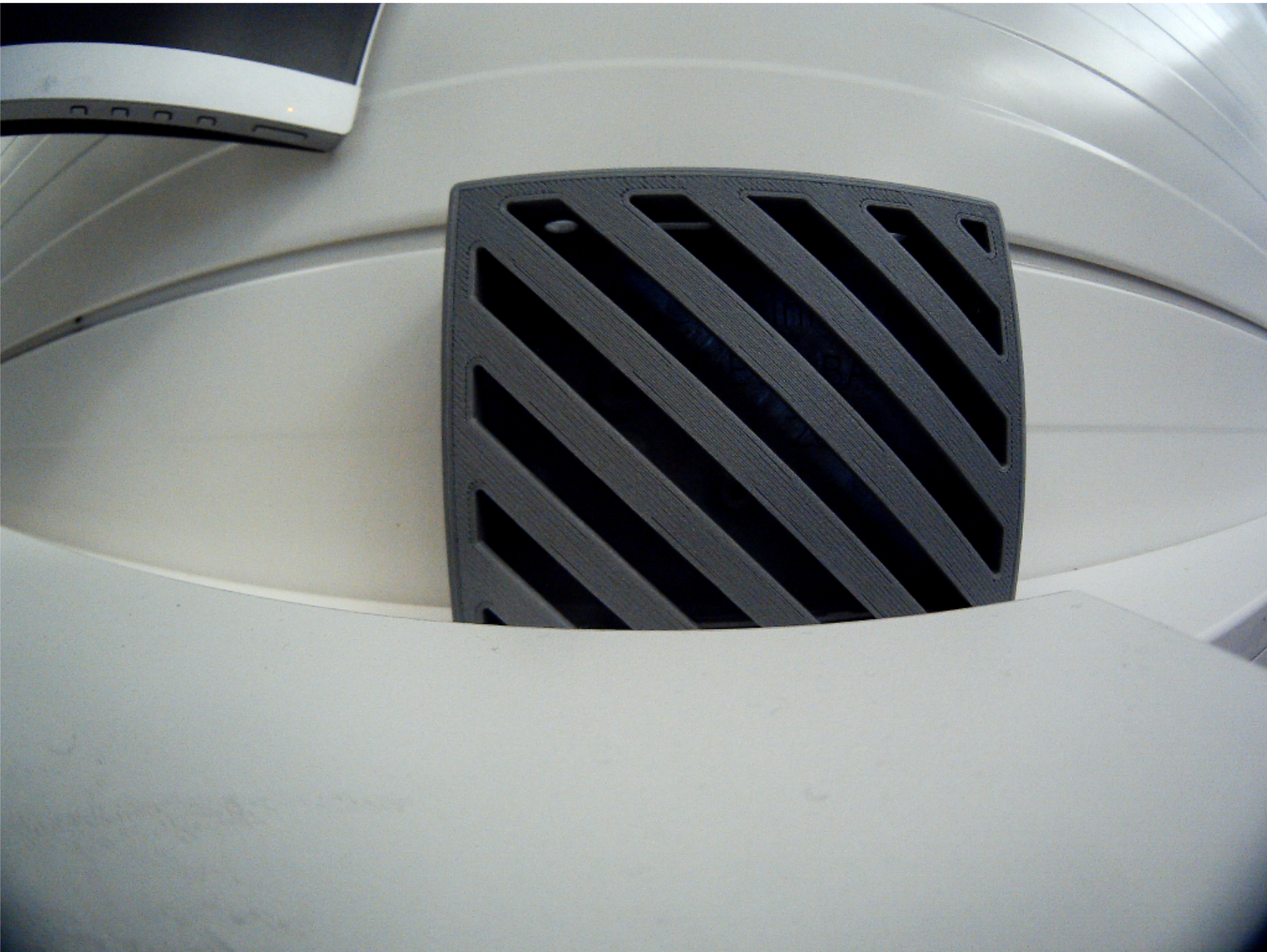 Illustration of the fisheye distortion correction process. (a) shows the original distorted image captured by the camera.
